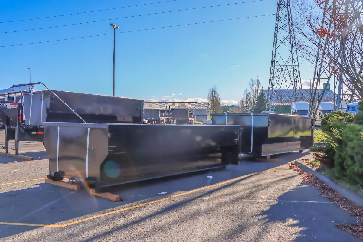 Roll-off dumpster ready for waste disposal at job site for Construction Dumpster Rental in West Donegal